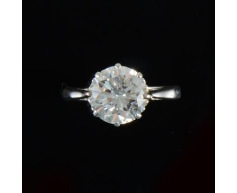 A diamond solitaire ring, the brilliant cut diamond claw set in an all white metal single stone mount, shank marked Plat, rin