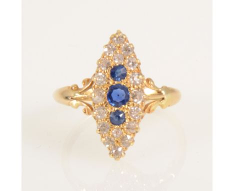 A sapphire and diamond marquise cluster ring, three round sapphires graduating in size and eighteen old cut diamonds claw set