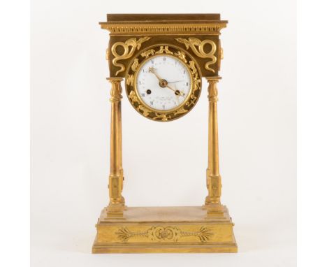 French Empire style ormolu portico clock, 19th Century, white enamelled dial signed Le Vol à Paris with a date sweep centre h