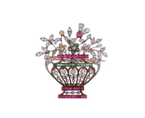 A FRENCH BELLE EPOQUE MULTI GEM GIARDINETTO BROOCH /PENDANT CIRCA 1910The pierced diamond set foliate detailed urn with chann