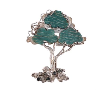 ANN O'DONNELL, TWO SILVER AND HARDSTONE TREE PENDANTS LONDON 1977The first with a textured silver tree with a trio of lobed w