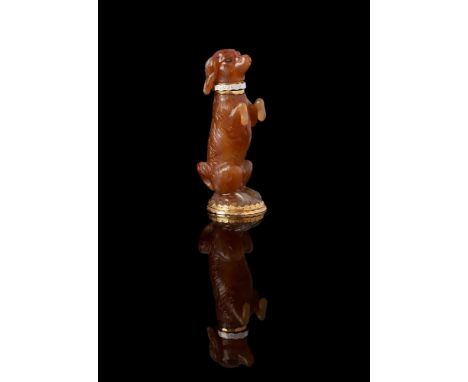 A MID 18TH CENTURY CARVED AGATE SCENT BOTTLECIRCA 1760, PROBABLY ENGLISHThe agate dog with rose cut diamond eyes, carved in a