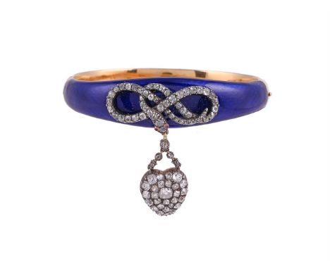 A MID VICTORIAN DIAMOND AND BLUE ENAMEL SERPENT BANGLE CIRCA 1870The polished blue enamel bangle with an applied old mine cut