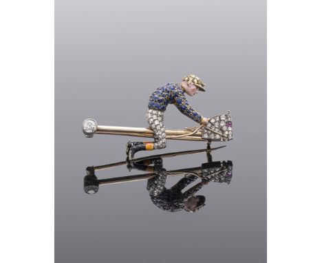 AN EARLY 20TH CENTURY SAPPHIRE, DIAMOND AND ENAMEL JOCKEY AND HOBBY HORSE BROOCH IN ROTHSCHILD COLOURS CIRCA 1905 The jockey 