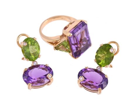 AN AMETHYST AND PERIDOT RING AND SIMILAR EARRINGSThe ring with a step cut amethyst flanked by two triangular cut peridots, th
