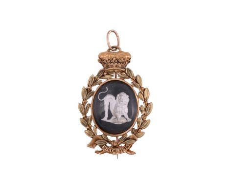 WELLINGTON INTEREST: A GOLD AND REVERSE PAINTED INTAGLIO COMMEMORATIVE BROOCH CIRCA 1814The silvered white reverse painted in