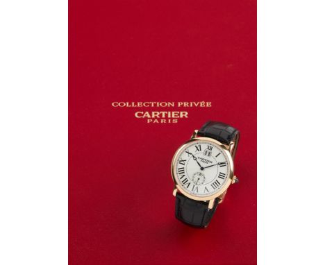 Y CARTIER, COLLECTION PRIVÉE, ROTONDE DE CARTIER, REF. W1550251AN 18 CARAT GOLD WRIST WATCH WITH DATE, NO. 127 28701, CIRCA 2
