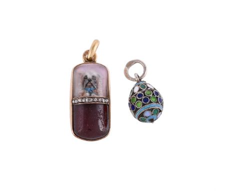 Y A RUSSIAN REVERSE PAINTED INTAGLIO OF A TERRIER AND GARNET PENDANT CIRCA 1910The squared cabochon with a long haired terrie