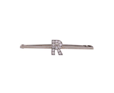 A DIAMOND SET INITIAL BAR BROOCH FIRST HALF OF THE 20TH CENTURYThe eight cut diamond set R, approximately 0.08 carats total, 