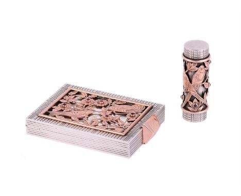BOUCHERON, A SILVER AND GOLD COLOURED INLAY COMPACT AND LIPSTICK, CIRCA 1940The compact with engine turned borders, pierced a