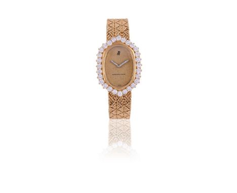 AUDEMARS PIGUET A LADY'S GOLD COLOURED AND DIAMOND BRACELET WATCH, NO. B 36977Movement: Cal. 2052, manual wind, 22 jewelsCase