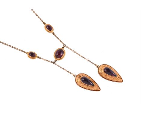A GARNET NEGLIGEE NECKLACEThe belcher link necklace with three oval cabochon garnet spacers with gold coloured rope twist bor
