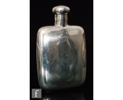 A hallmarked silver pocket flask of plain cushioned rectangular form, length 8cm, Birmingham 1913, Charles S Green &amp; Co L