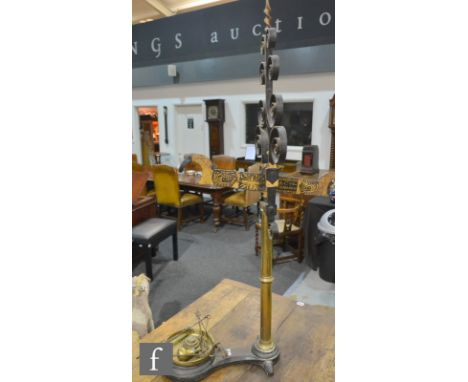 A set of 19th Century cast iron and brass platform scales by C A Wedderburn &amp; Co Southampton with brass pan and weights, 