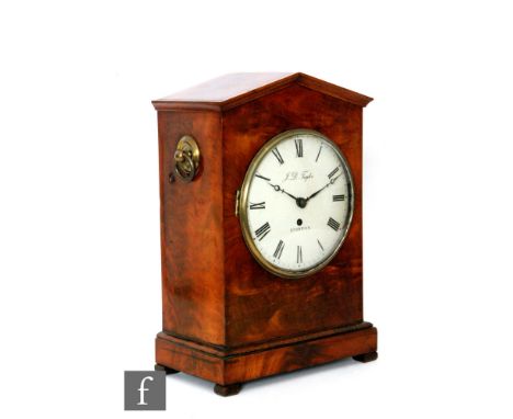 A 19th Century mahogany bracket clock of architectural form, with brass ring loop handles, an unsigned single fusee movement 