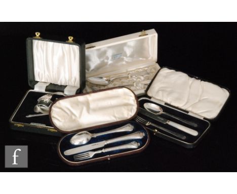 Four cased sets of flatware to include two knife, fork and spoon sets, a pusher set and a further French silver spoon and for