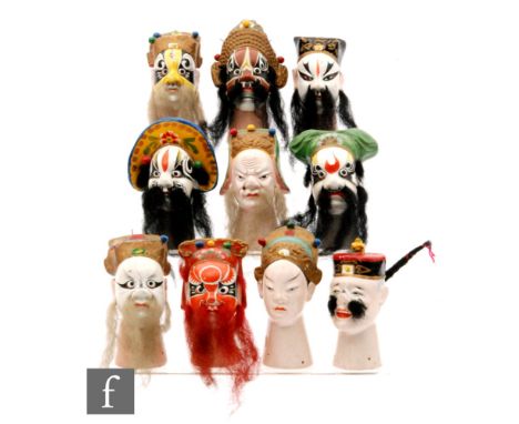 A collection of early 20th Century Japanese ceramic finger puppets with hand painted decoration modelled as various Kabuki Th
