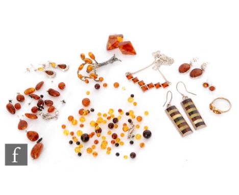 A parcel lot of assorted silver and white metal mounted Baltic amber jewellery to include a necklet, earrings, a 9ct ring, be