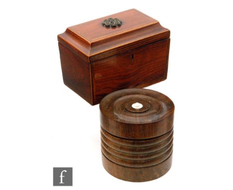 A 19th Century mahogany rectangular tea caddy with strung detail and brass flower detail to cover, length 18cm, with a circul