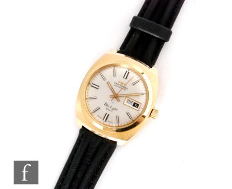 A later 20th Century Technos Sky Light, automatic, gold plated wrist watch, batons, day and date facility to a circular silve