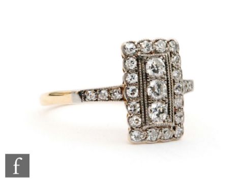 A mid 20th Century 18ct diamond cluster ring, rectangular head, the three vertically set stones within a diamond border, all 