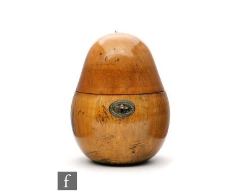 A fruit wood tea caddy modelled as a pear with brass escutcheon and part silver lined interior, height 18cm, S/D. 