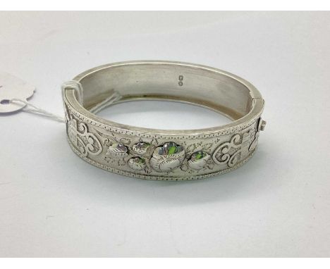 A Victorian Hallmarked Silver Highly Decorative Aesthetic Hinged Bangle, S.Bros, Birmingham 1884, decorated with foliage vine