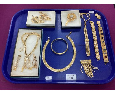 A Selection of Highly Decorative Gilt Coloured Costume Jewellery, including diamanté necklaces, clip on drop earrings, bangle