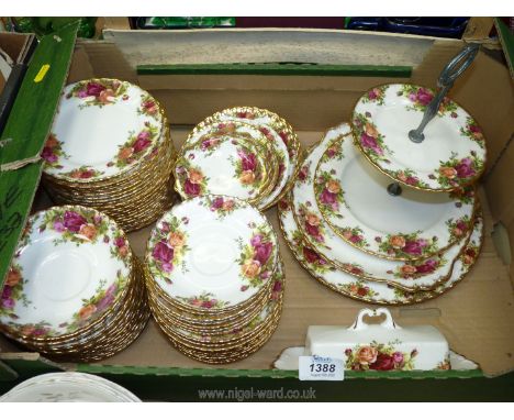 A quantity of Royal Albert 'Old Country Roses' to include eighteen 5" saucers,  twenty-four 6" side plates, cake stand, 10" s