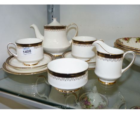 A Paragon 'Clarence' tea set for two to include; cups, saucers, side plates, bowl, jug and teapot.