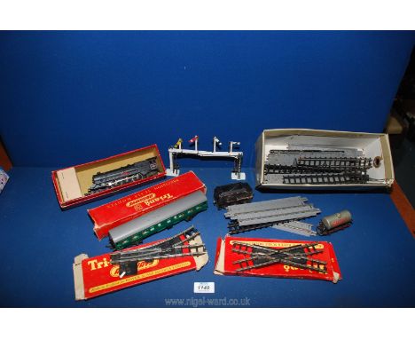 A box of Tri-ang OO gauge to include; track, signal points, restaurant carriage, Princess Elizabeth engine boxed, etc. 