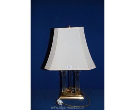 A glass and brass double Lamp and large cream lamp shade, 24" tall.