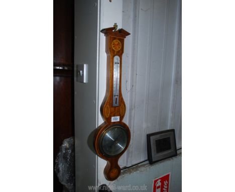 A contemporary Barometer and thermometer with marquetry shell decoration, 26'' long.