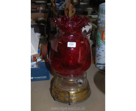 A large brass church Oil Lamp with cranberry glass shade, single wick burner, 17'' tall including chimney.