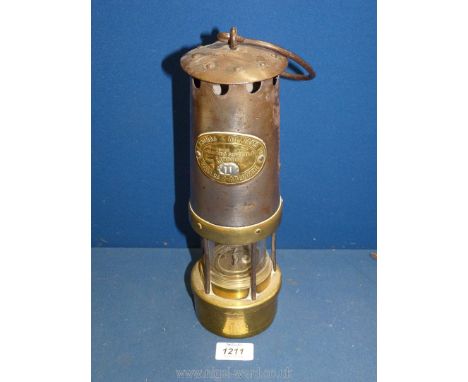 A brass and metal E. Thomas &amp; Williams Ltd. Aberdare miners lamp, 12 1/2" high.