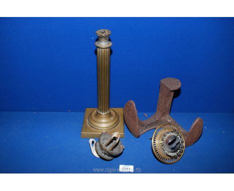 A brass column lamp without glass (top a/f), brass oil light fittings and cast shoe lasts.
