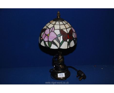 A Tiffany style table lamp and shade, 14" tall.