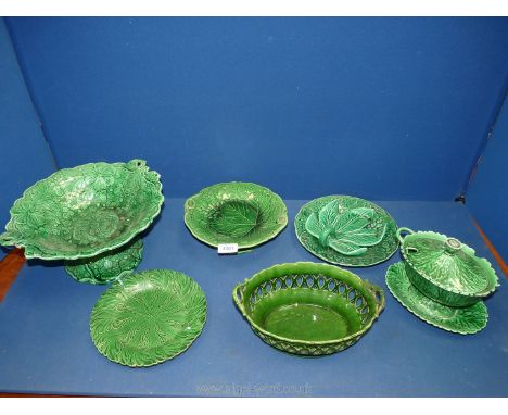 A box of green majolica leaf items including cake plate, serving dish, plates, etc, some badly a/f.