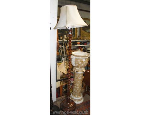 A twist pillar Mahogany standard lamp cream shade.