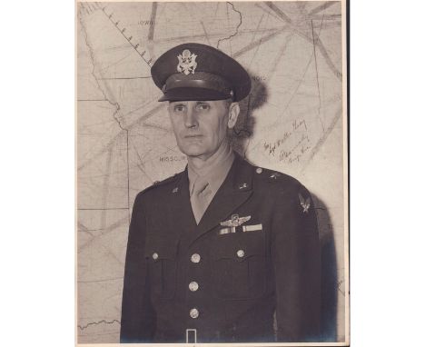 Large portrait of Brigadier General standing in front of a map of central United States in full uniform and cap.Silver gelati