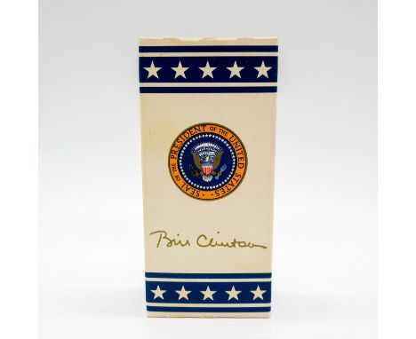 Political memorabilia; chocolate candy box with the presidential seal and Bill Clinton's signature.Commemorative pack of red,