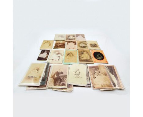 Featuring thicker card photo material or plastic protective layer covering on majority of photos. Depicts individual children