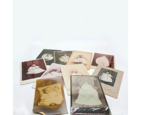 Featuring thicker card photo material or plastic protective layer covering on all photos. Depicts infants and toddlers in por