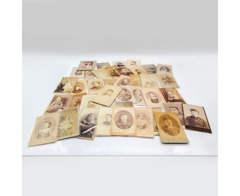 Featuring thicker cardstock on all photos and some also include plastic holder. Depicts portrait photos of female individuals