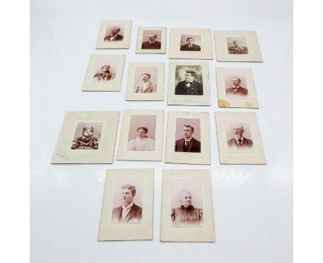 Featuring photos centered on thicker cream toned cardstock. Photos are similar to passport photo size. Depicts portrait photo