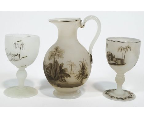 A Richardson vitrified enamel colours glass jug, decorated with a scene of women and a moor by a desert well, with a goblet d