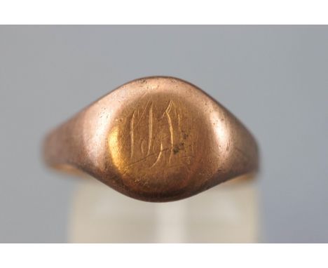 A rose metal signet ring with personal inscription (worn) Hallmarked 9ct gold, Birmingham, 1919. Size: R (approximately - sha