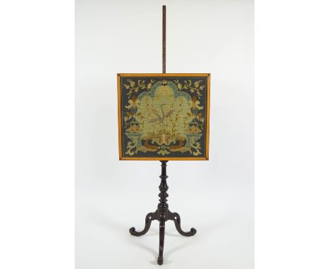 A Victorian firescreen with tapestry banner on a mahogany pole on tripod carved cabriole leg base, 155cm high x 57cm wide x 4