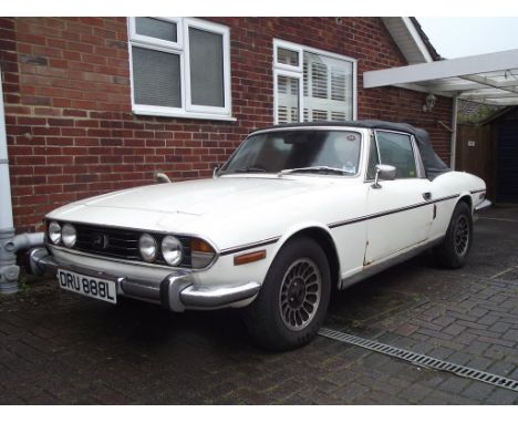 A 1973 Triumph Stag, registration number DRU 888L, chassis number LD217070, engine number LF 02133HE, white. This desirable m