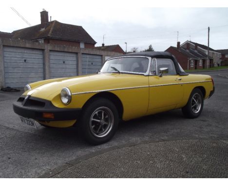 A 1979 MG B Roadster, registration number UTK 333V, chassis number GHN5-493543G, engine number 31897, Snapdragon yellow. This